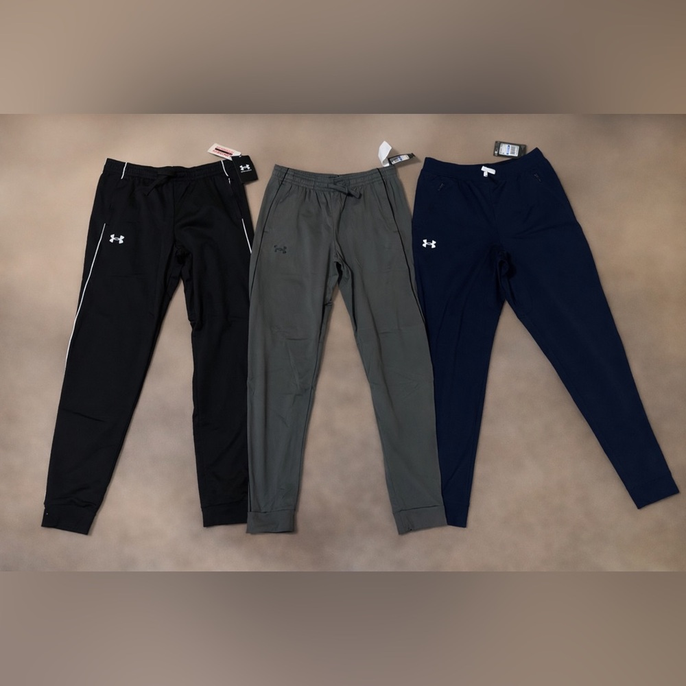 Lot of 3 pairs of NWT Under Armour boys youth XL Athletic Pants. $60 for all 3